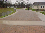 Reducing the width of the street and lessening the amount of impervious surfaces on the site decreases the environmental impacts that humans will leave.